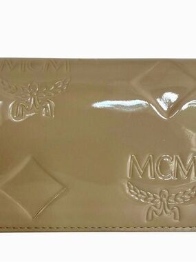 MCM NWOT Mini Patent Leather
Wallet Beige Embossed Logo
Coin Card/Holder & dusty